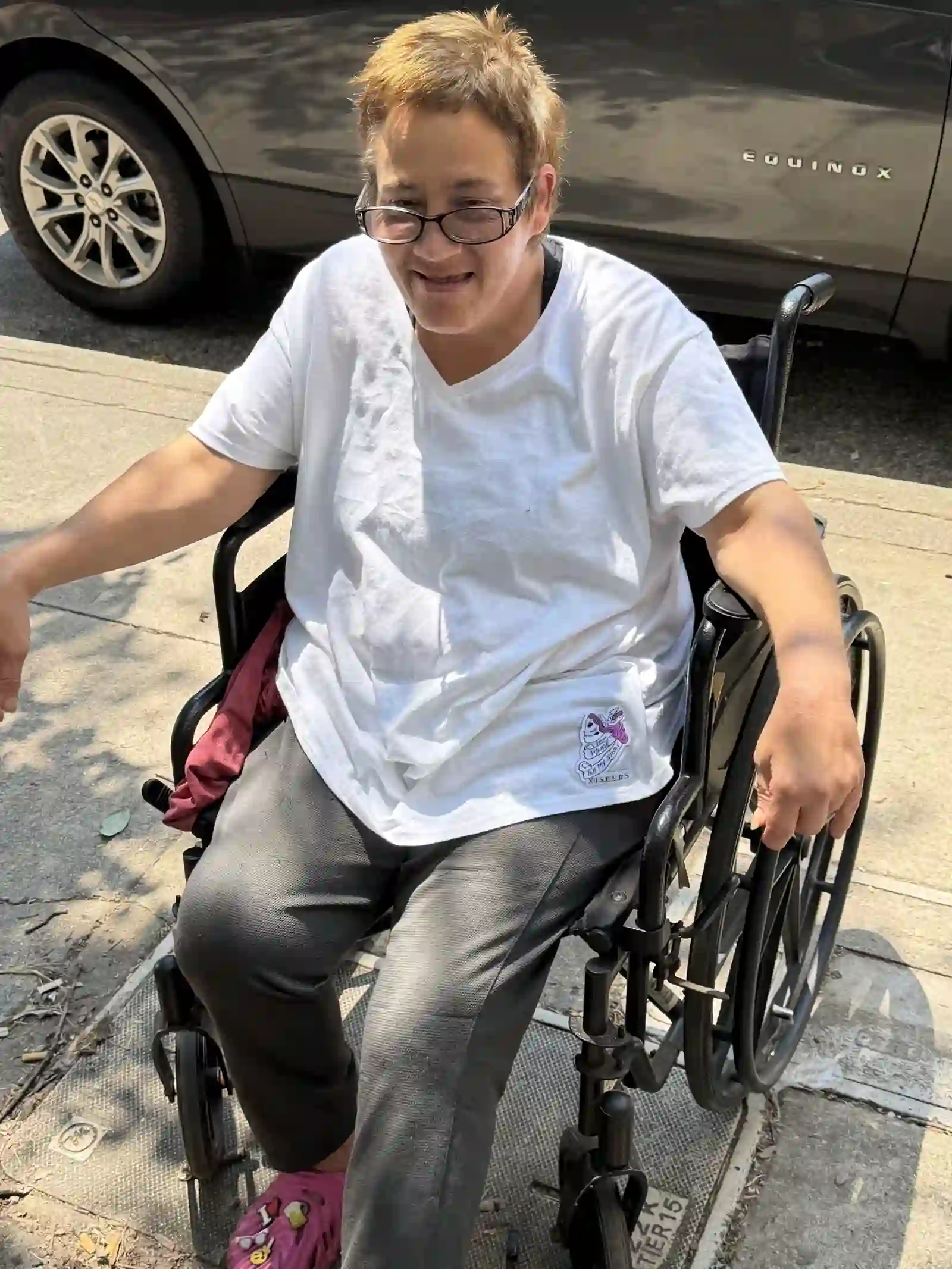 Man in a wheelchair at the outreach event